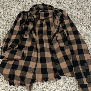 Brown and black risen flannel